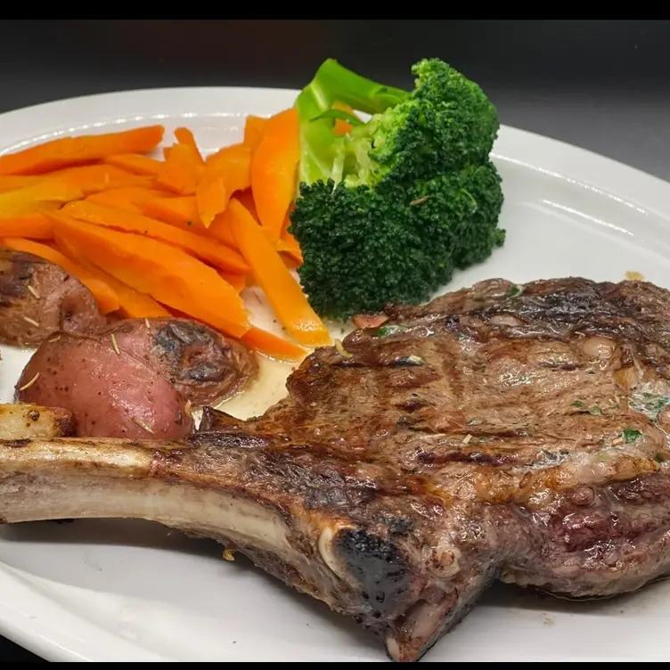 Riccio's Steak and Seafood signature dishes Veal ParmesanFilet MignonShrimp ScampiClams Casino﻿﻿﻿